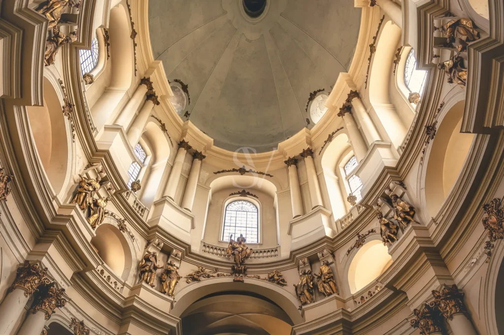 Ornate church dome interior lit by warm natural light